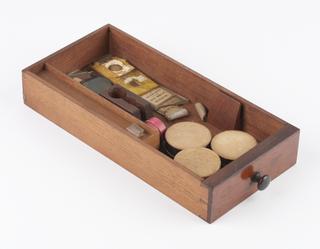 Drawer containing glass slides from box for compound microscope