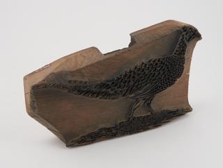 Face plate stamp, featuring game bird