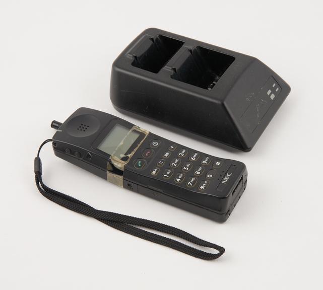 NEC Mobile Phone and Docking Station | Science Museum Group