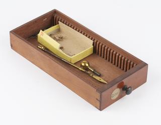 Drawer containing microscope accessory