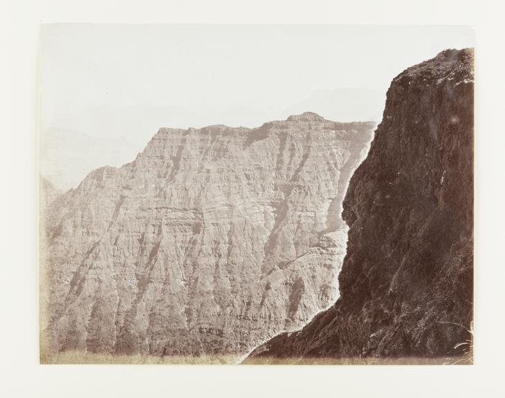 Mounted albumen print by Samuel Bourne titled "Cliffs at