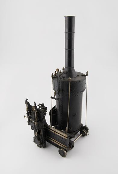 Model (scale 1:8) of 7 track channelling machine with boiler