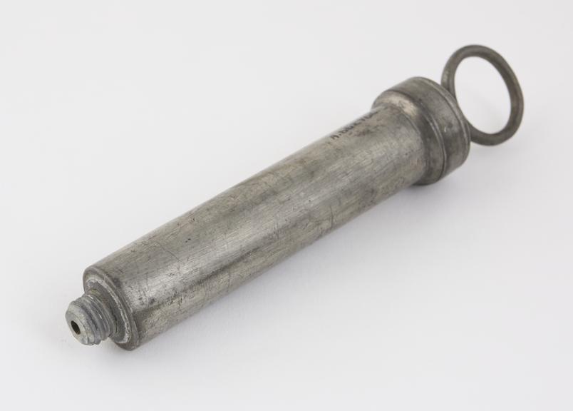 Pewter piston-action syringe