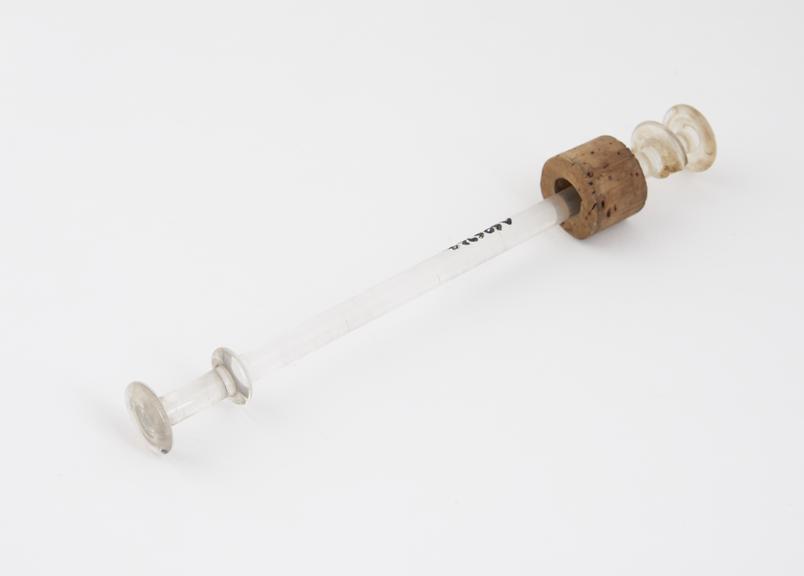 Glass piston for a syringe