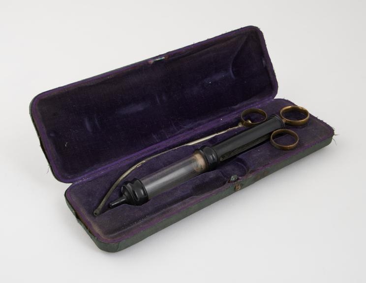 Glass and vulcanite intra-uterine syringe, Braun's type, in case