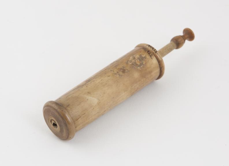 Ivory piston action syringe, 17th century