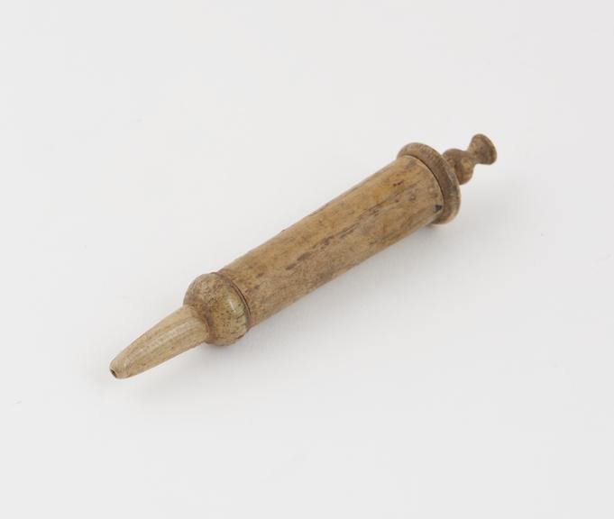 Ivory piston action syringe, 17th century