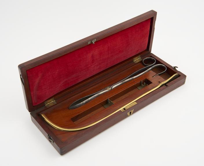 Lithotomy instrument set, incomplete, in mahogany case