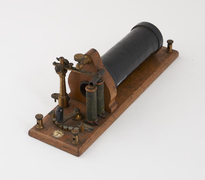 Induction coil (de Watteville's coil) mounted on wooden base