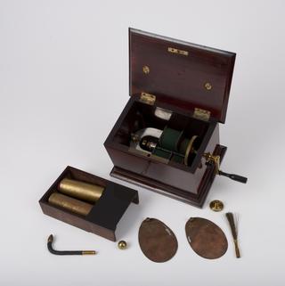 Hand-cranked electrotherapy apparatus with Clarke-type magneto