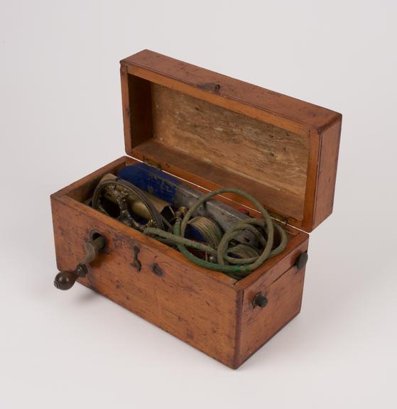 Clark's electromagnetic machine in rectangular wooden box