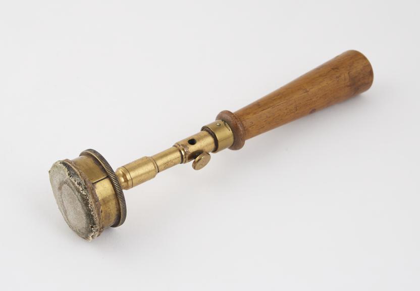 Electrode with turned wooden handle, metal stem