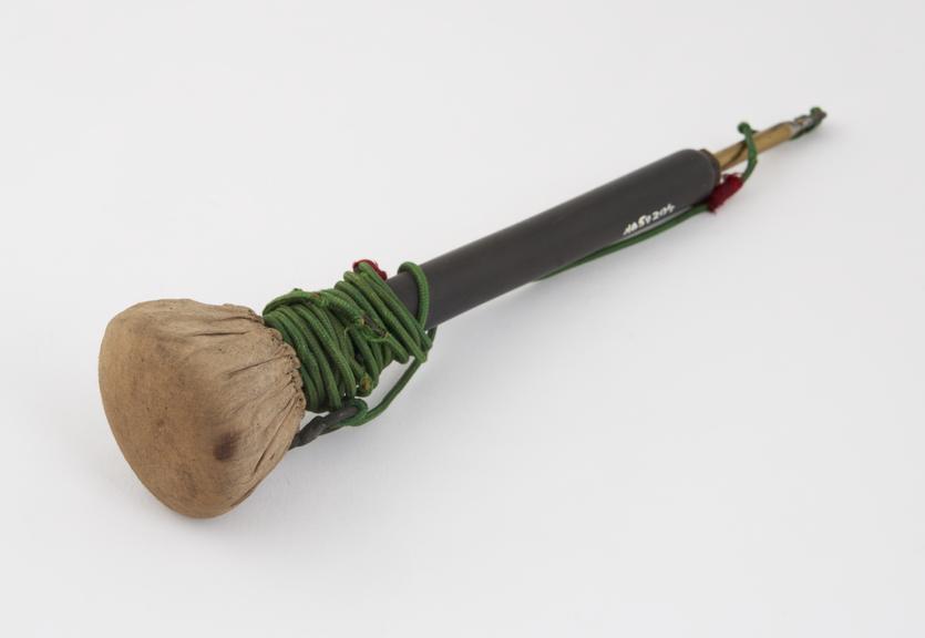 Electrode with long vulcanite handle and cloth covered head