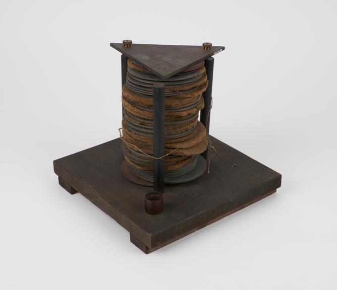 Home-made voltaic pile consisting of wooden base with pile made