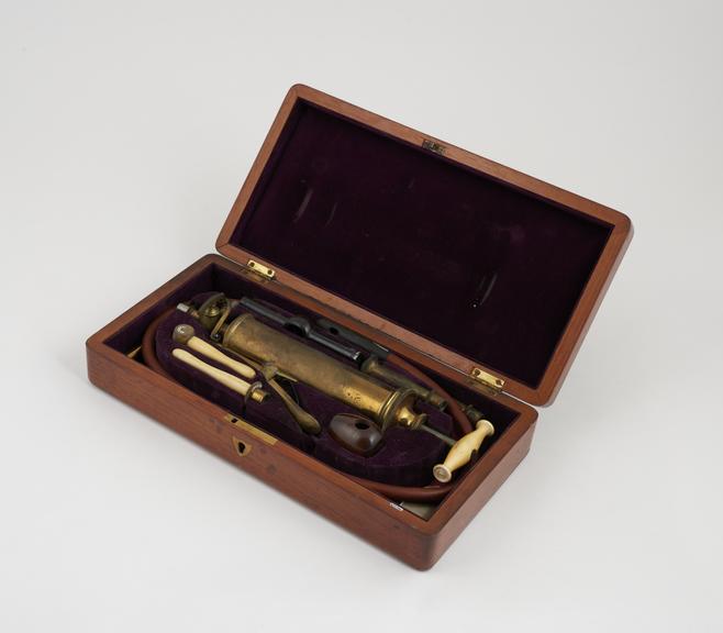 Combined stomach pump and enema syringe set, brass and ivory