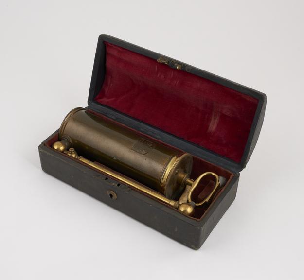 Reservoir enema, in leather case with pewter and ivory rectal