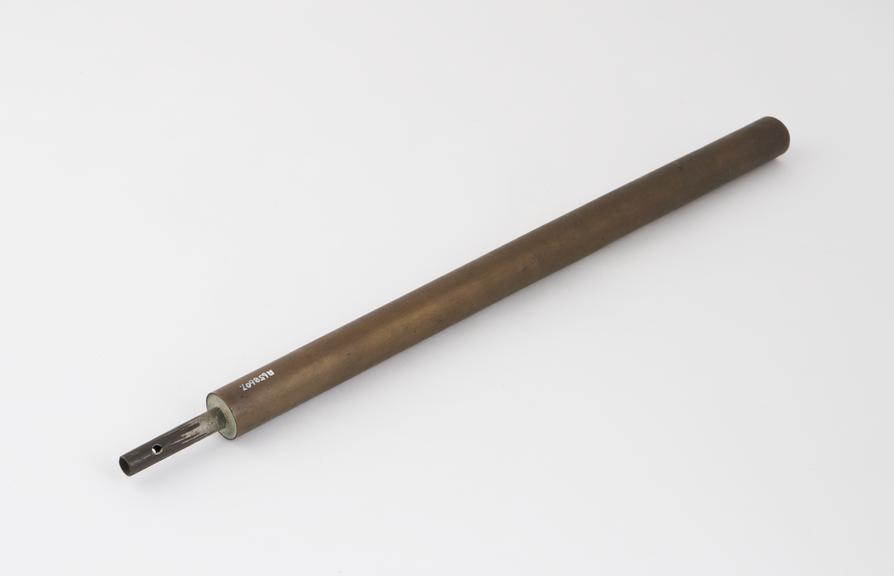 Conducting rod of brass partly filled with grey coloured paste