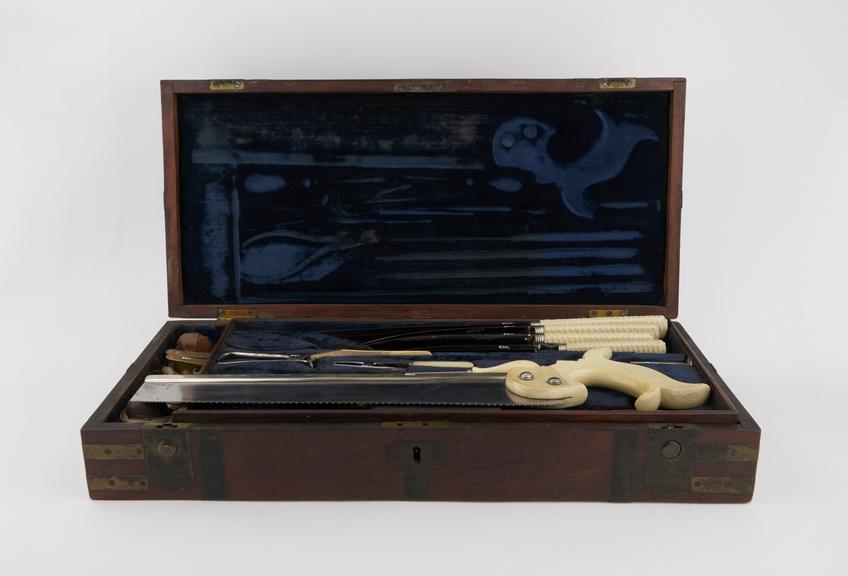 Surgical instrument set in a case, manufactured by Laundy