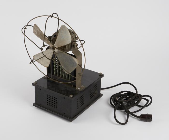 Ozonator (?), electric fan and coils mounted on bakelite and