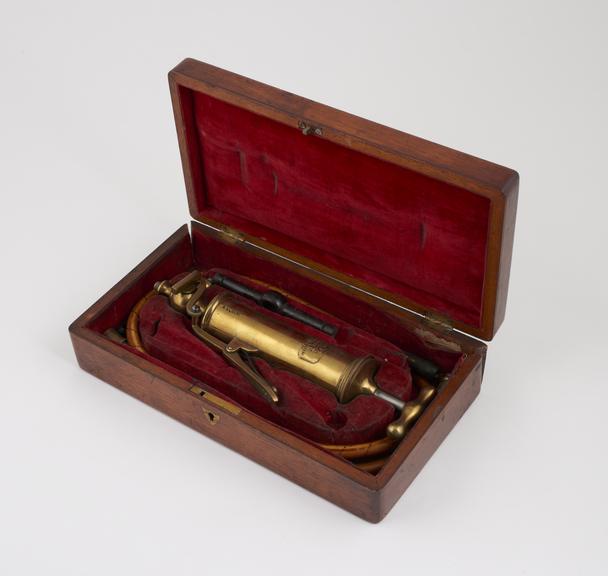 Set of stomach pumping instruments in mahogany case, by Bailey