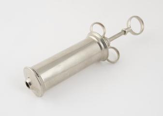Metal syringe