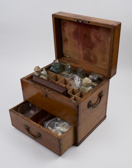 Medicine chest, oak, with 14 glass bottles, all labelled