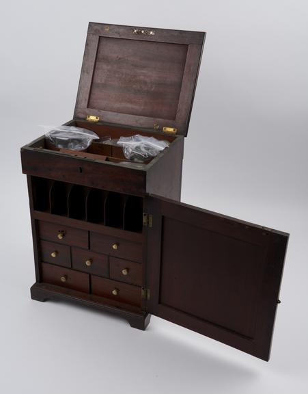 Medicine chest, mahogany, with 14 glass bottles, 3 labelled