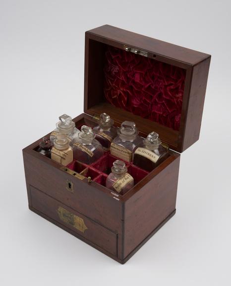 Medicine chest, with 12 labelled bottles, (and 2 unlabelled)