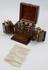 Small walnut(?) medicine chest with 2 hinged front sections and