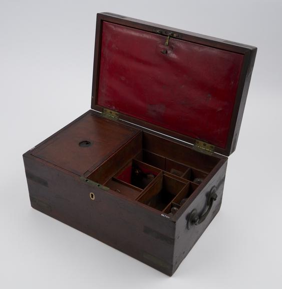 Mahogany medicine chest with3 unlabelled glass bottles