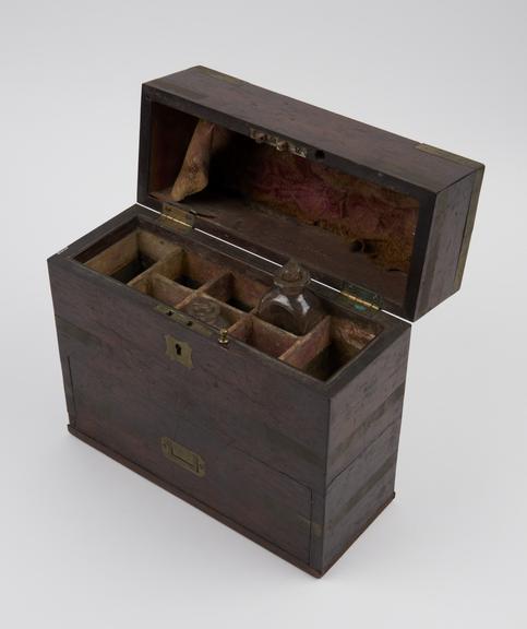 Brass bound mahogany medicine chest with 12 glass bottles