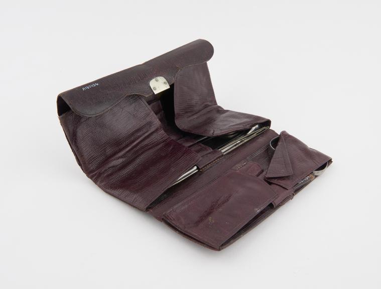 Pocket surgerical instrument set in three-fold leather case