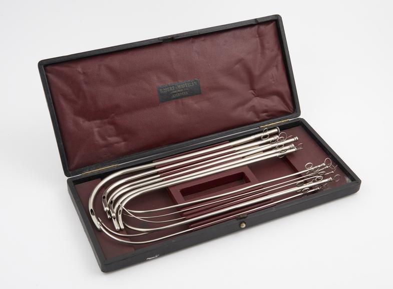 Cased set of 12 plated metal catheters, made by Robert Whitelaw