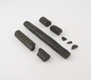 Two cylindrical sticks of Chatterton's Compound (one broken)