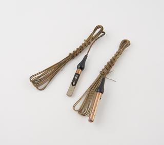 Two sectioned No.6 LT electric copper dummy detonators