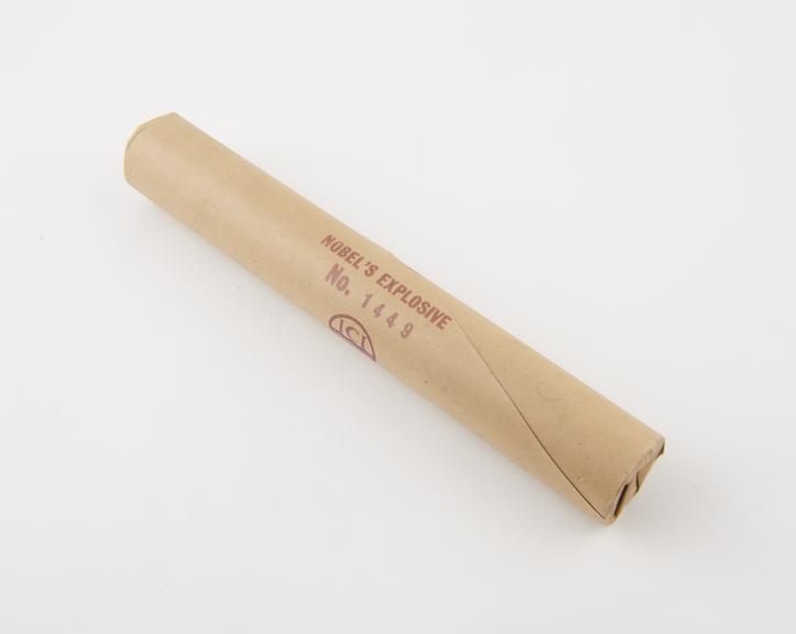 Cylindrical stick of explosive substitute in cream paper