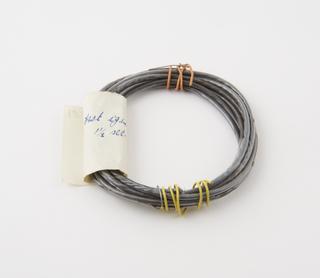 Grey plastic coated dummy igniter cord