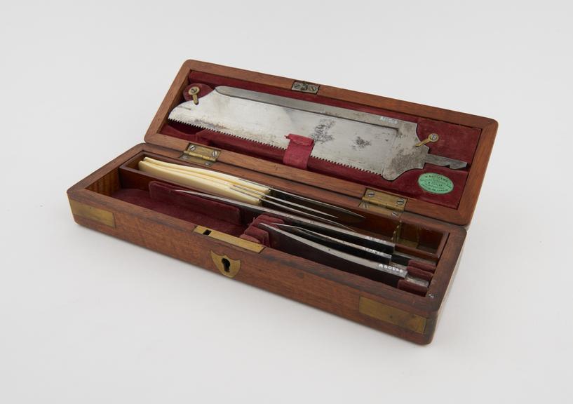 Set of surgical instruments in wooden case