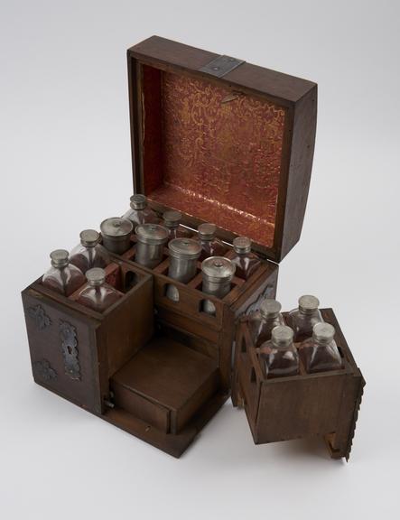 Ironbound walnut(?) medicine chest with hinged lid and 2 hinged