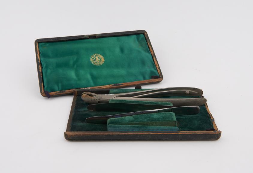 Three forceps, cased, by S