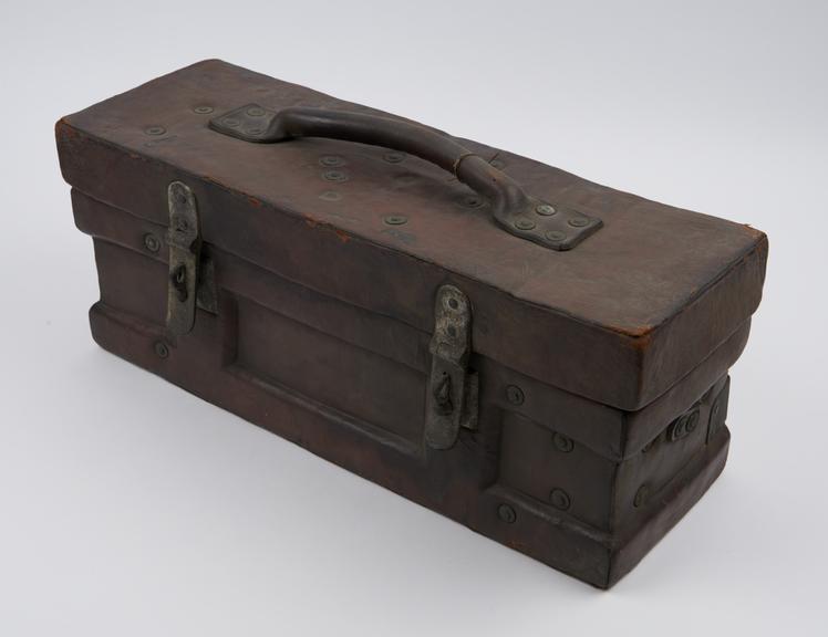 Empty leather medicine chest, lined with canvas