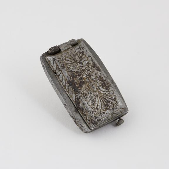 Tinder-box (length 2 5/8 ins); on lid, a flower, in brass