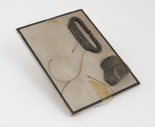 Flint, steel, and tinder, from tinder-box made from the shells of two half-gourds, West Indies, 1910
