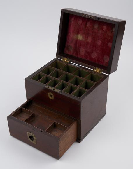 Rectangular wooden medicine chest with front-opening drawer