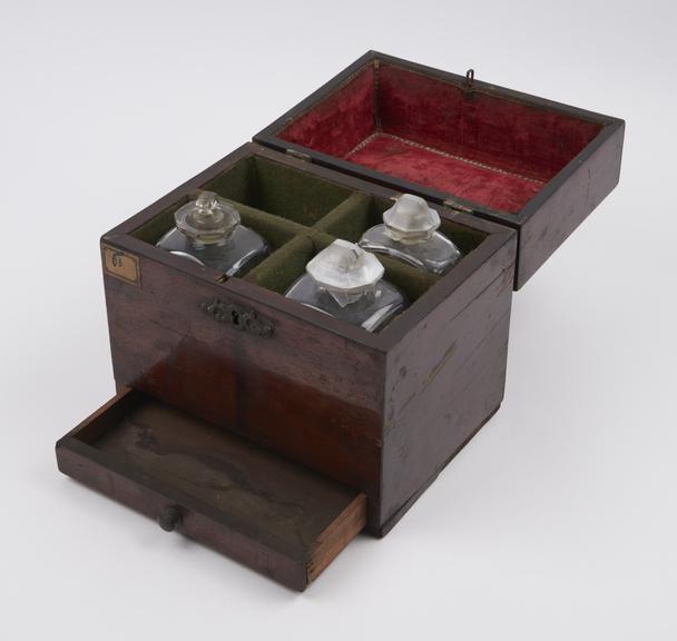 Medicine chest, containing three unlabelled glass bottles