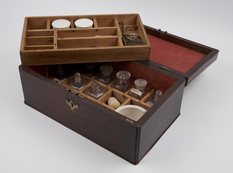 Medicine chest, hinged top, with 11 glass bottles, empty