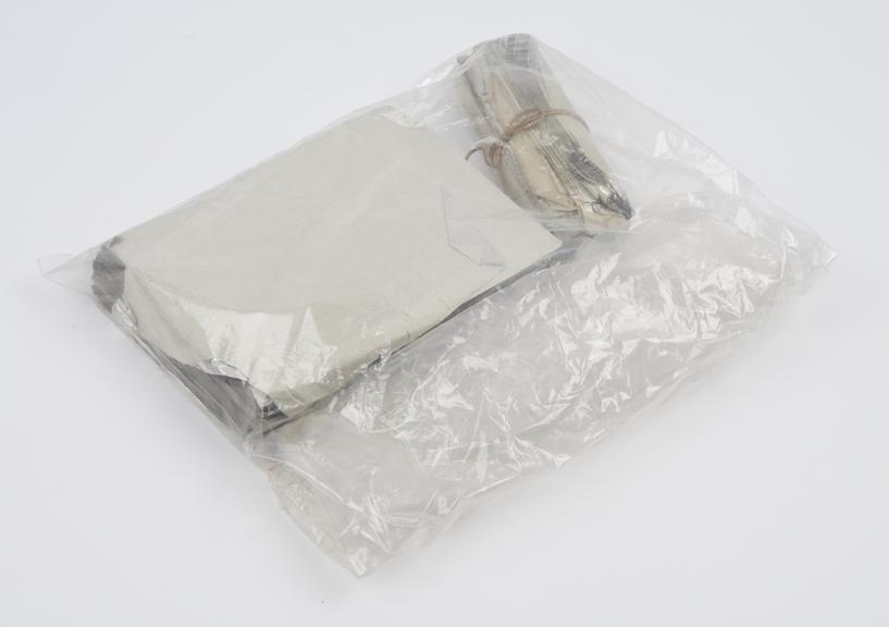 Packet containing sheets of uncut radar-jamming foil ("window") (radar-jamming foil)