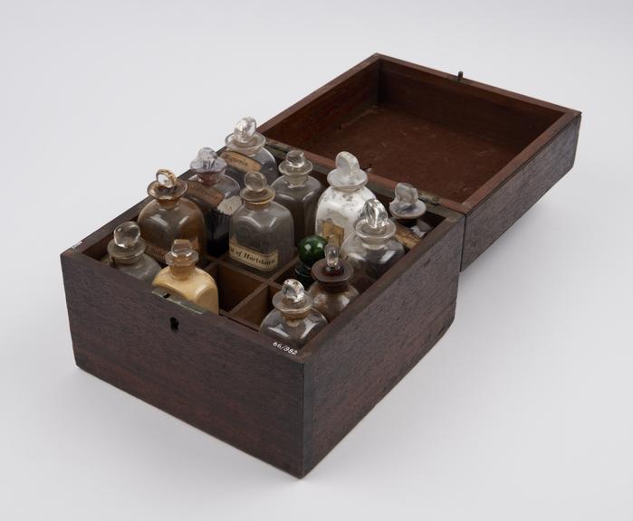 Medicine chest, hinged, sixteen equal compartments for bottles