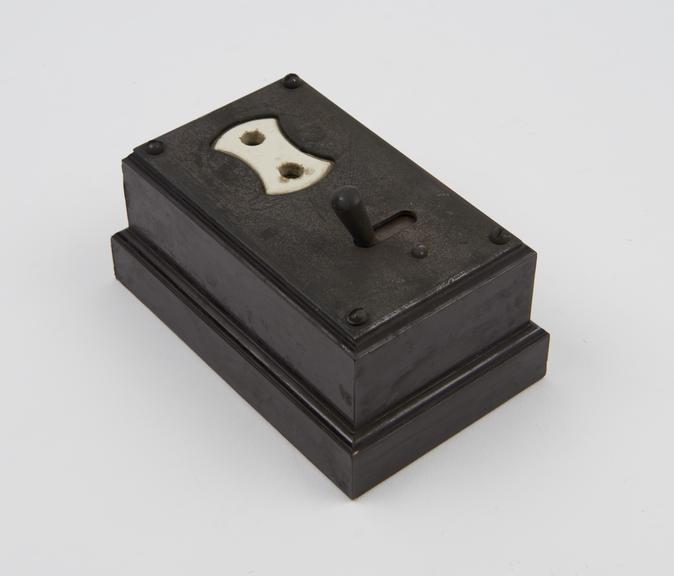 MK' 15A 2 pin switch-socket with bakelite case and metal cover'