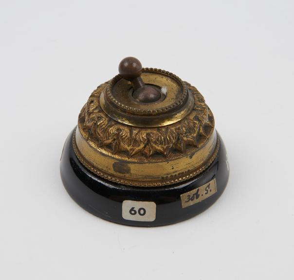 Switch, black porcelain, incorporating a fuse, by Verity